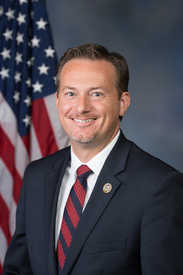 Official portrait of Rep. Michael Cloud
