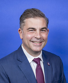 Official portrait of Rep. Mike Carey