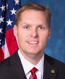 Official portrait of Rep. Michael Guest